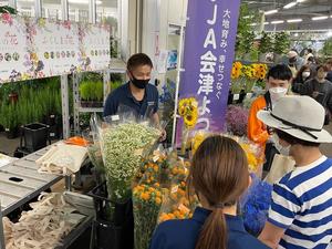 世田谷花きでのPRの様子の内容を表示