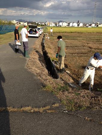 就農予定地の測量の様子の内容を表示