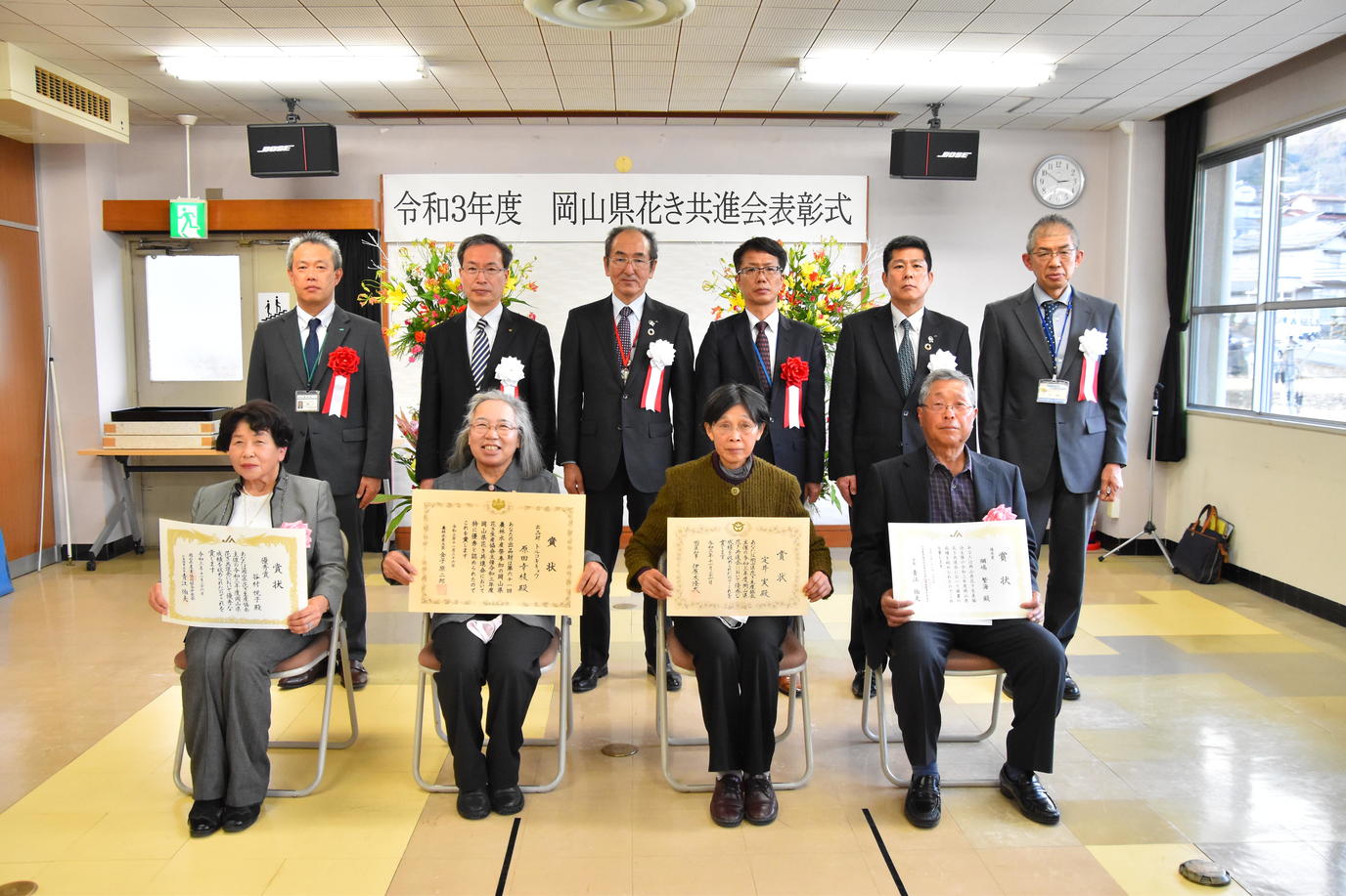 記念写真　前列受賞者（左から、谷村悦子様、原田幸枝様、定井実様、綱嶋繁海様）の内容を表示